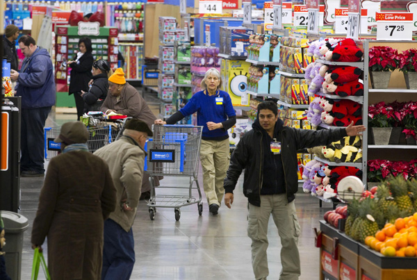 Walmart employee gives direction