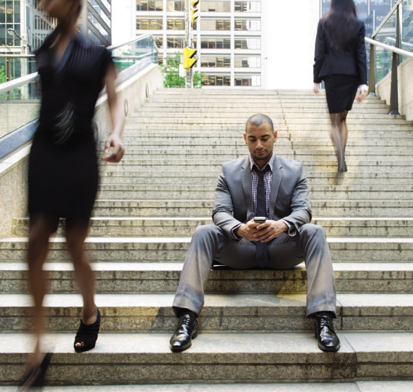 Man on the stairs with smartphone