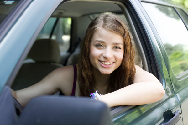 Teen girl behind the wheel